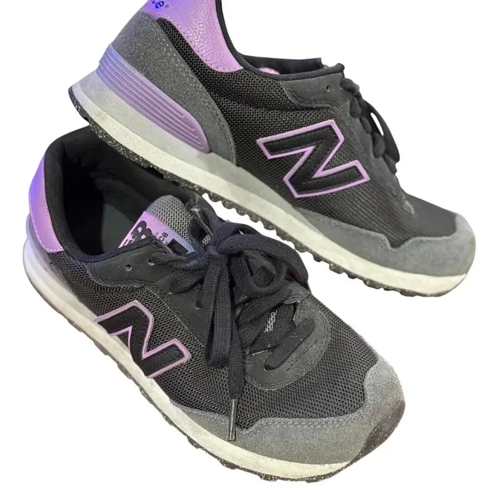 New balance 515 sneakers in black, grey, and purple tongue labels